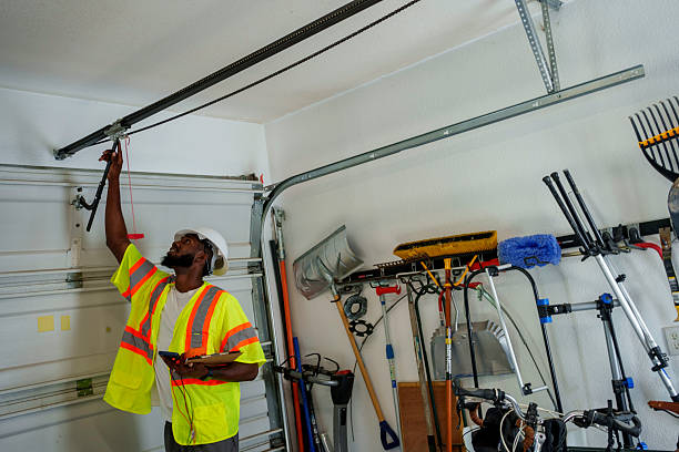 Professional Garage Door Panel Replacement technician working in Berthoud, CO